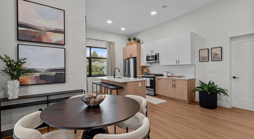 Furnished dinning room on hard wood style flooring 