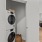 Stacked washer and dryer in laundry closet